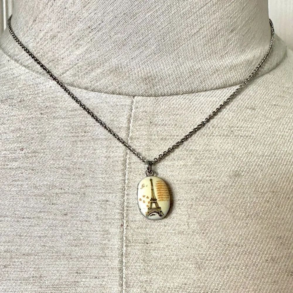 Silver tone dainty Eiffel Tower locket necklace